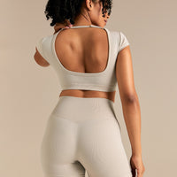 Motion Seamless Open Back Short Sleeve Crop Top | Stone